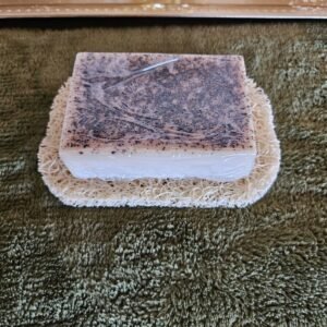 Beige Soap Saver Pad with Bar Soap for Non-Slip Use Showing A Goat Milk Bar Soap for Gentle Exfoliation